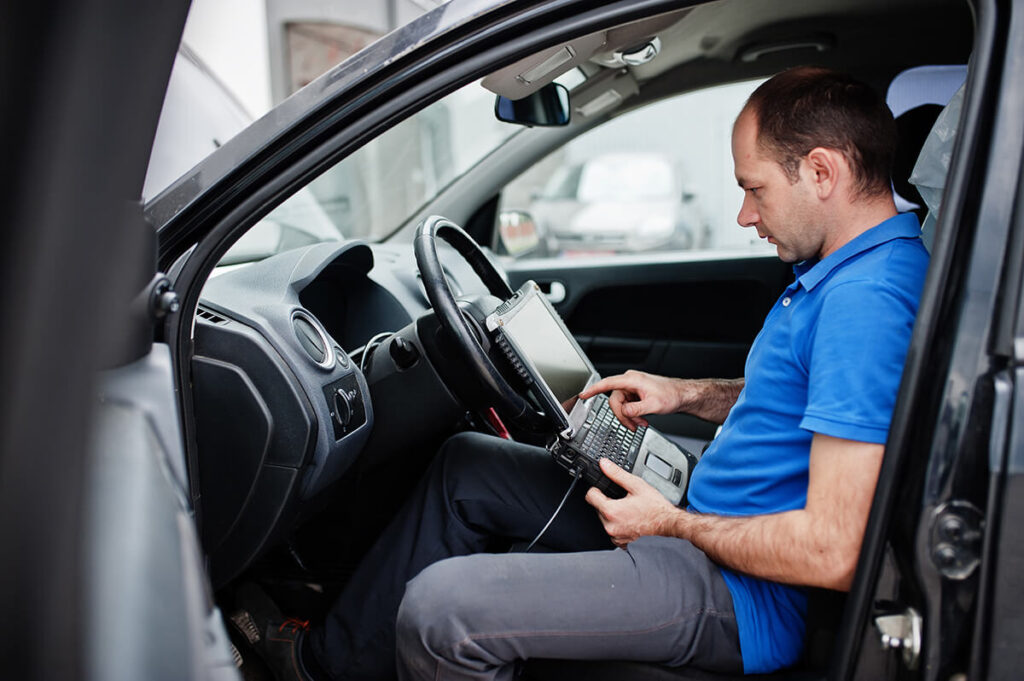 repairing electronic system in car during service