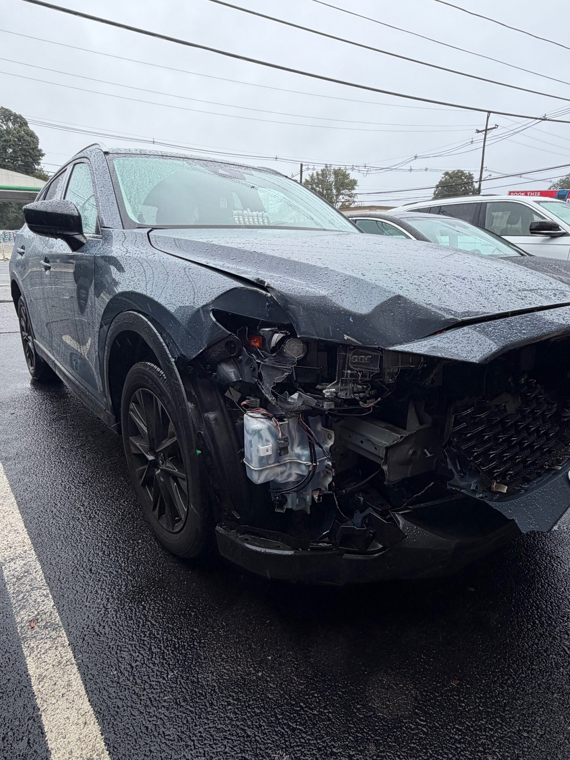 2023 Mazda CX-5 right-front collision damage before repair